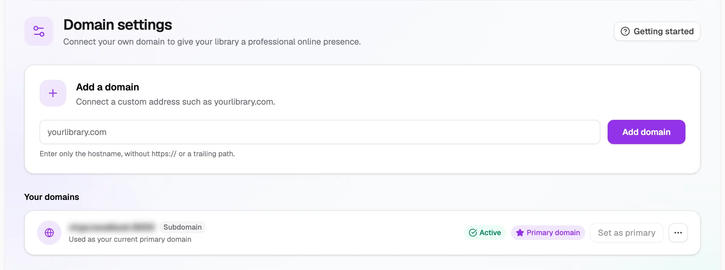 Domain settings with the Add a domain box and Your domains list showing the free subdomain as primary